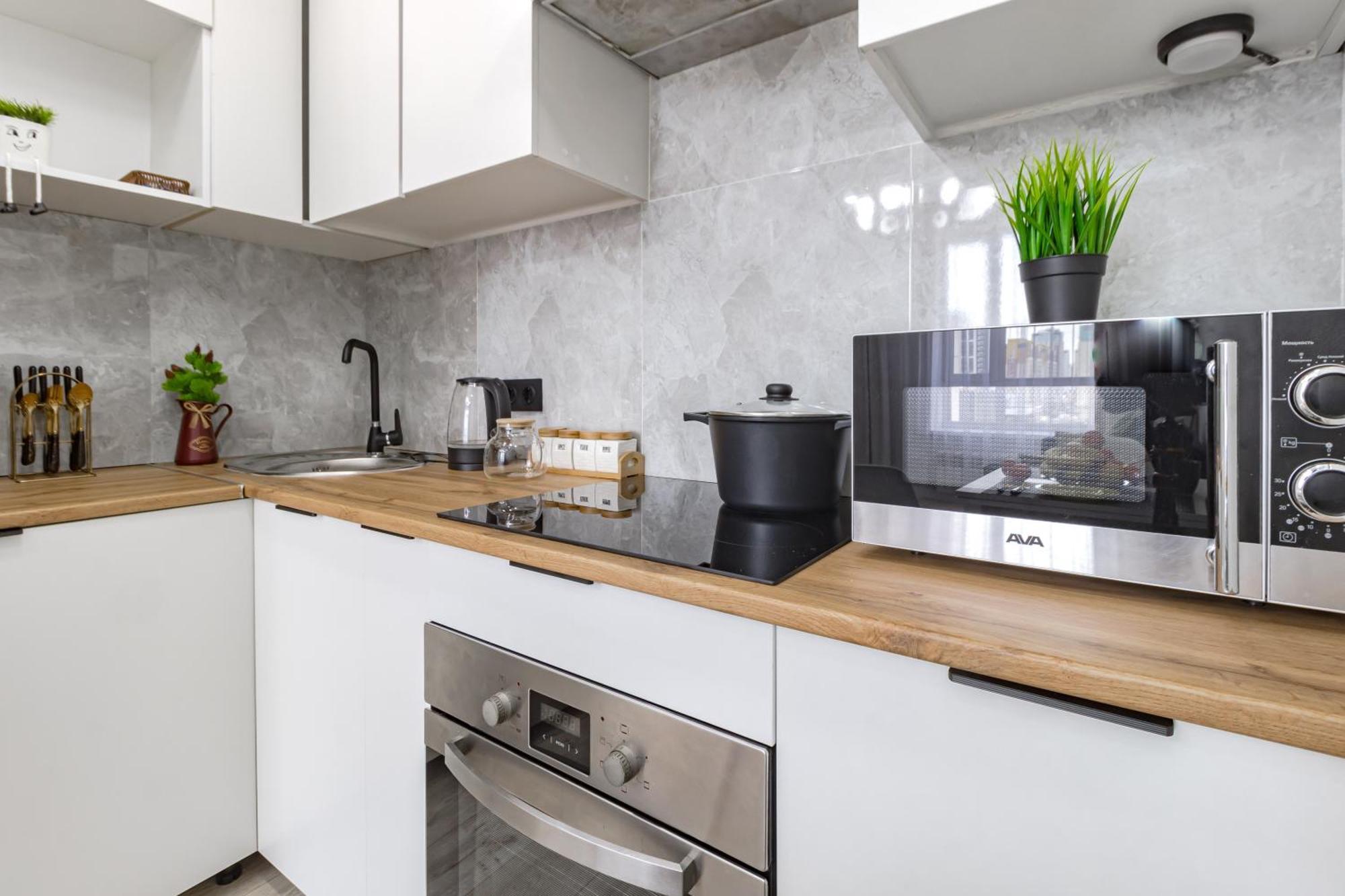уютные в центре города жк Alpamys возде ботанического сада Apartment