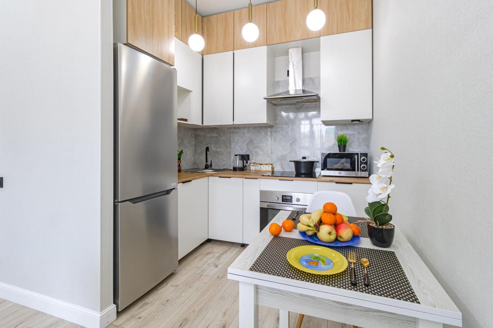 уютные в центре города жк Alpamys возде ботанического сада Apartment