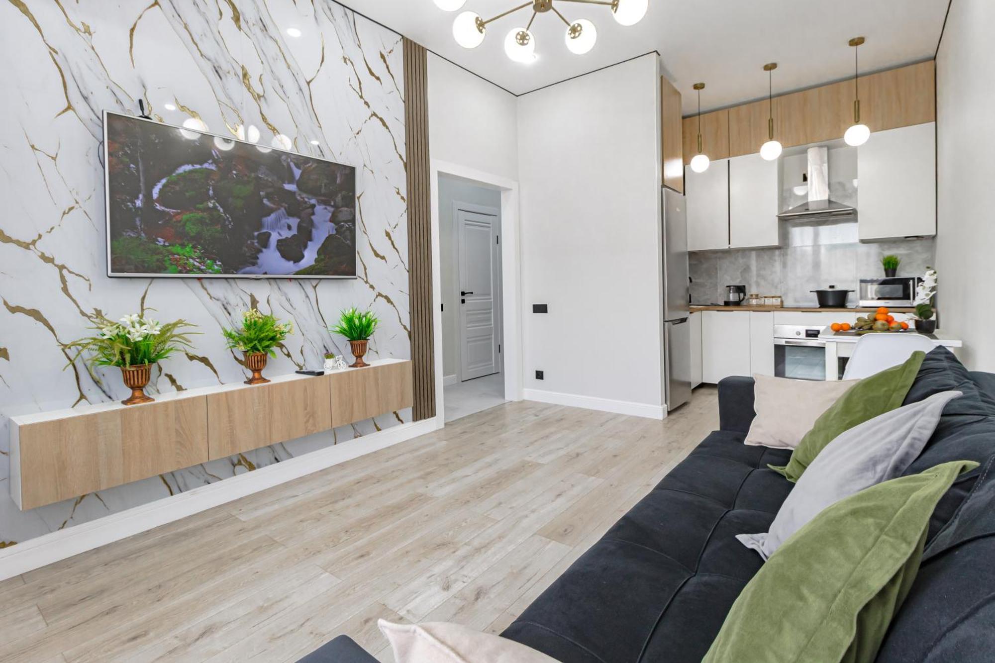 уютные в центре города жк Alpamys возде ботанического сада Apartment